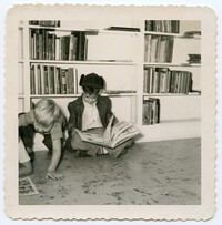 Child Reading a Book