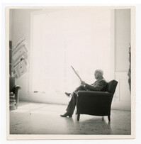 Man Reading Newspaper