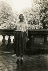 Girl in costume on porch of Main Library (2)