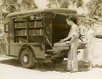Bookmobile stopped on an unidentified beach
