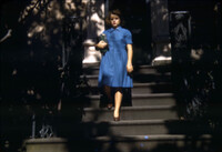 Young woman on front steps, Main Library