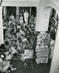 Children gathered in reading room, Main Library