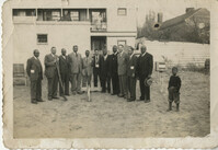 Group of men posing at Cannon Street YMCA ground breaking
