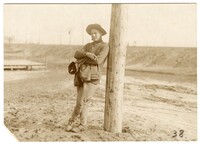 Photo of Edwin Pearlstine Sr. Leaning Against a Post