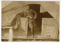 Photo of Edwin Pearlstine Sr. Outside a Tent at Camp Sevier
