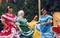 Fotografía de cuatro bailarinas de Puerto Rico, Festival Hispano./ Photograph of Four Puerto Rico Dancers, Hispanic Festival