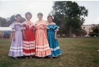 Foto grupal de cuatro bailarines de Puerto Rico. / Group Photo of Four Puerto Rico Dancers