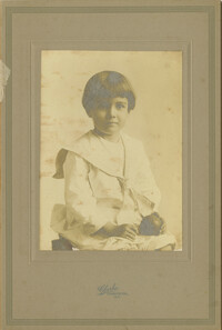Child Holding a Ball