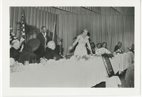 Unidentified Woman Speaking at Dinner Ceremony