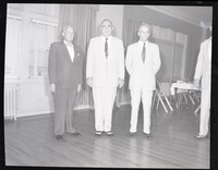 Group Photo of Three Men Standing