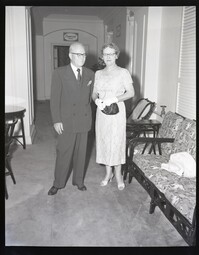 Group Photo of Man and Woman in Hallway