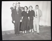 Group Photo with Four People Standing