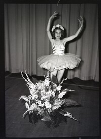 Child Dancer Posing in Costume with Flowers