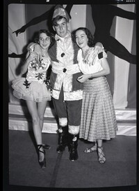 Photo with Two People in Costume and One in Plain Clothes
