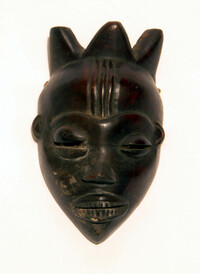 Smoked ivory ornamental face mask
