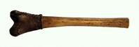 Bone drumstick with leather covering for use with slit gong