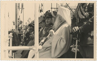 Officials observing a military ceremony, Photograph 3
