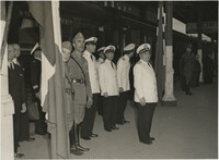 Military officials at a train station, Photograph 14