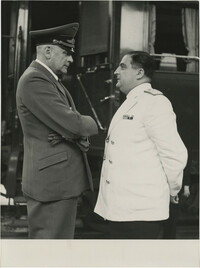 Military officials at a train station, Photograph 2