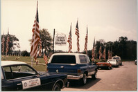 Photograph of a Ceremony at the Avenue of Flags in the Veterans Garden