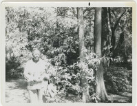 Photograph of a Woman Standing Outdoors
