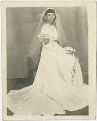 Photograph of a Woman Wearing a Wedding Gown