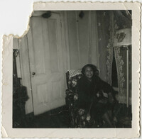Photograph of a Woman Seated in a Living Room
