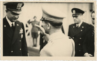Mario Pansa greeting military personnel, Photograph 1