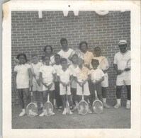 Photograph of Children with Tennis Rackets