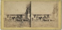 Group of People Outside Large Cabin