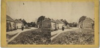 African Americans and Cabins at Battery Plantation