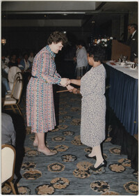 Photograph of Two People Shaking Hands