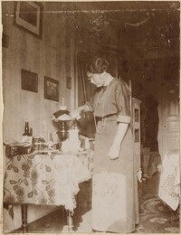 Woman pouring from kettle