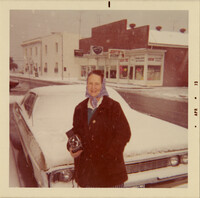 Lucille Culp with her camera on Bay Street after the snowfall