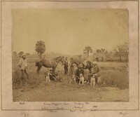 Group portrait of the Donner Brothers, their servants, T. Coleman, Benjamin Lawrence, and McComb posing with five hunting dogs and two fine horses on the Pacific Guano Company land at Chisolm Islands.