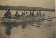 10 people in a boat on the river near Halls Island