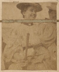 Broad smile on the face of an unidentified woman