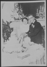 Pincus and Renee with wedding cake 1953